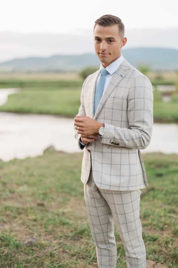 Wedding Reception at Twenty and Creek Groom Posing